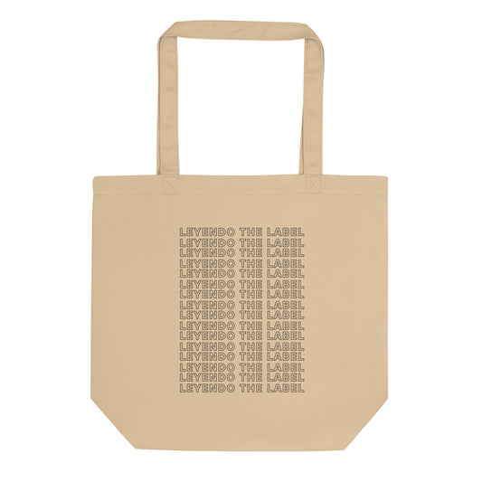 durable tote bag in stone with printed 'leyendo the label' slogan